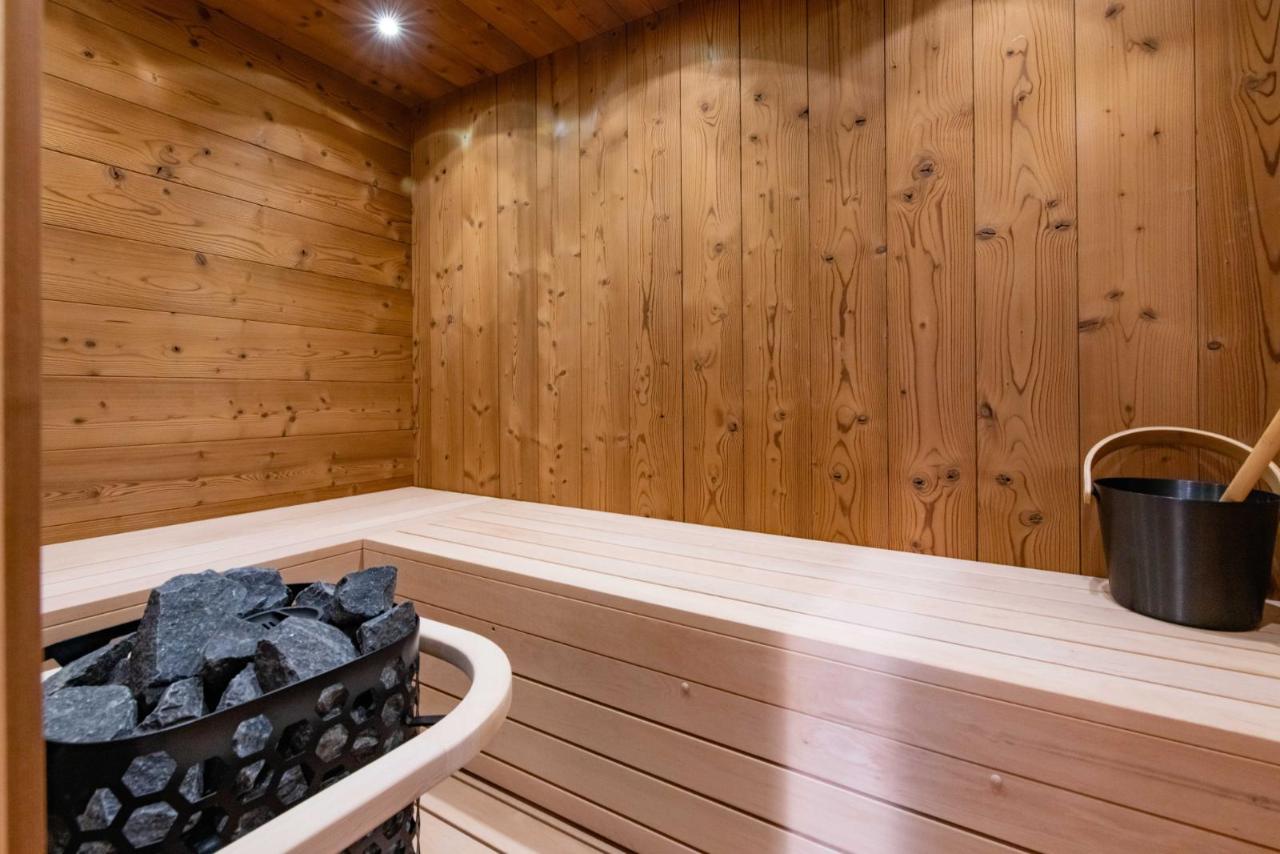 Warm pine interior with L-bench and pillar basket heater